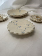 Handmade and hand painted pottery trinket dish, with handpainted blue underglaze and finished in a clear glaze, 3” with foot
