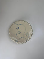 Handmade and hand painted pottery trinket dish, with handpainted blue underglaze and finished in a clear glaze, 3” with foot